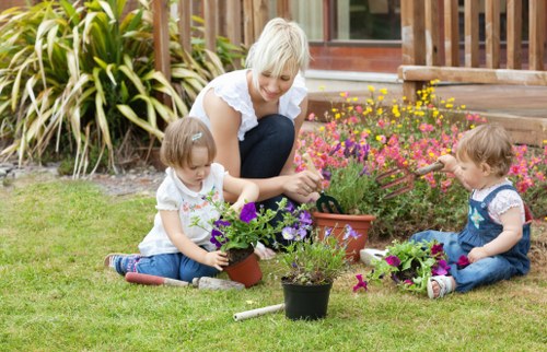 Landscape gardening in Church End with patio and planting